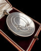 LARGE SCALE VICTORIAN SILVER ‘GARTER MOTIF’ LOCKET