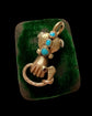 GEORGIAN HIGH CARAT GOLD HAND WITH SNAKE PENDANT