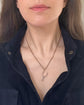 ANTIQUE PLATINUM SPUR PENDANT