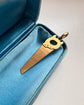 VINTAGE 18CT GOLD SAW PENDANT