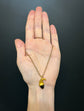 MID 19TH CENTURY GARNET & HIGH CARAT GOLD ACORN PENDANT