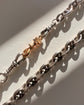 A PAIR OF ANTIQUE CHUNKY 18CT GOLD TWIST DOG CLIPS
