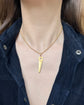 VINTAGE 18CT GOLD SAW PENDANT