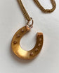 VICTORIAN 15CT GOLD HORSESHOE PENDANT ‘SLOW RACE’