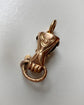 GEORGIAN HIGH CARAT GOLD HAND WITH SNAKE PENDANT