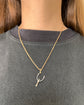 ANTIQUE PLATINUM SPUR PENDANT