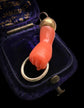 EARLY 19TH CENTURY CORAL HAND PENDANT