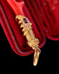 ANTIQUE 15CT GOLD SNAKE & CORAL PENDANT