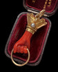 EARLY 19TH CENTURY CORAL HAND PENDANT