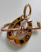 VICTORIAN 15CT GOLD & GEM SET HORSESHOE PENDANT