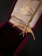 A 9CT GOLD & PEARL SWALLOW PENDANT