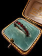 GEORGIAN FACETED GARNET ETERNITY RING