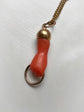 EARLY 19TH CENTURY CORAL HAND PENDANT