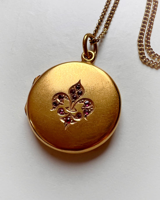 ANTIQUE 15CT GOLD & RUBY MULTI ‘FAMILY’ DISC LOCKET