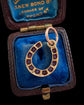 ANTIQUE NATURAL RUBY & 18CT GOLD HORSESHOE PENDANT