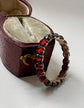 GEORGIAN FACETED GARNET ETERNITY RING