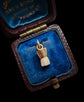 19TH CENTURY MILK TOOTH PENDANT