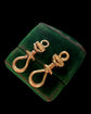 A PAIR OF ANTIQUE CHUNKY 18CT GOLD TWIST DOG CLIPS