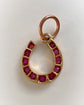 ANTIQUE NATURAL RUBY & 18CT GOLD HORSESHOE PENDANT