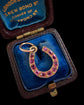 ANTIQUE NATURAL RUBY & 18CT GOLD HORSESHOE PENDANT