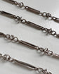 ANTIQUE SILVER TROMBONE ALBERT CHAIN