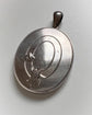 LARGE SCALE VICTORIAN SILVER ‘GARTER MOTIF’ LOCKET