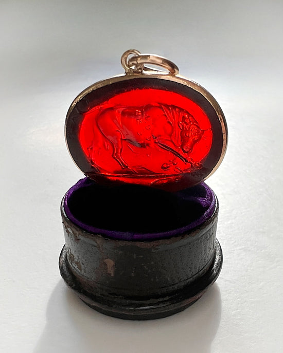 19TH CENTURY GLASS INTAGLIO OF ‘DIONYSIAN BULL’