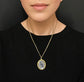 VICTORIAN ORNATE GOLD FRAMED GLASS LOCKET