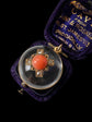 VICTORIAN ROCK CRYSTAL DOME LOCKET WITH DIAMOND & CORAL CENTRE