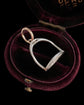 ANTIQUE PLATINUM STIRRUP PENDANT