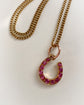 ANTIQUE NATURAL RUBY & 18CT GOLD HORSESHOE PENDANT