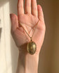 ANTIQUE SILVER GILDED EGG PENDANT