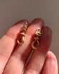 A PAIR OF 18CT GOLD CHUNKY ANTIQUE TWIST DOGCLIPS