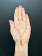 EARLY 19TH CENTURY CORAL HAND PENDANT