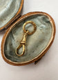 VICTORIAN 9CT DOGCLIP WITH ORIGINAL CHASED BAIL