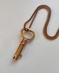 ANTIQUE HIGH CARAT GOLD BRAMAH KEY PENDANT