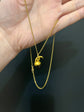 MID 19TH CENTURY GARNET & HIGH CARAT GOLD ACORN PENDANT