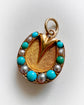 VICTORIAN 15CT GOLD & TURQUOISE HORSE HOOF PENDANT