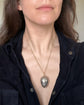 ANTIQUE SILVER EGG PENDANT