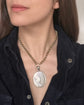 LARGE SCALE VICTORIAN SILVER ‘GARTER MOTIF’ LOCKET