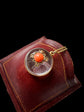 VICTORIAN ROCK CRYSTAL DOME LOCKET WITH DIAMOND & CORAL CENTRE