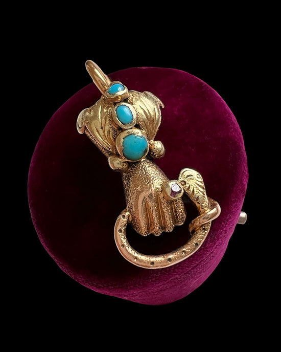 GEORGIAN HIGH CARAT GOLD HAND WITH SNAKE PENDANT