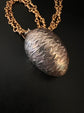19TH CENTURY SILVER EGG PENDANT