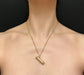 A 19TH CENTURY DIAMOND & PEARL PENCIL PENDANT