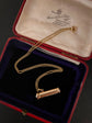 A 19TH CENTURY DIAMOND & PEARL PENCIL PENDANT