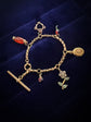 ANTIQUE 9CT GOLD CHARM CHAIN BRACELET