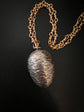 19TH CENTURY SILVER EGG PENDANT