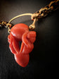 EARLY 19TH CENTURY CORAL CHERUB PADLOCK PENDANT