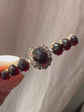 VICTORIAN DIAMOND HORSESHOE AND GARNET BROOCH