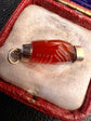 GEORGIAN CARNELIAN CLASPED HAND PENDANT